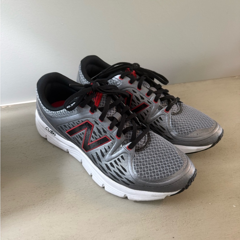 New Balance Gray and Black Sneakers with Red Highlights
